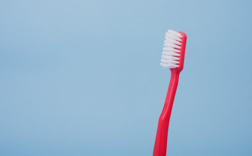 Toothbrush against a plain background
