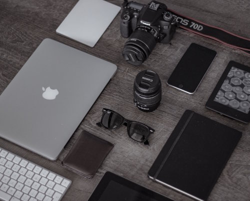 Electronic devices (Canon EOS 70D, camera lens, smartphone, Kindle, iMac, etc.)